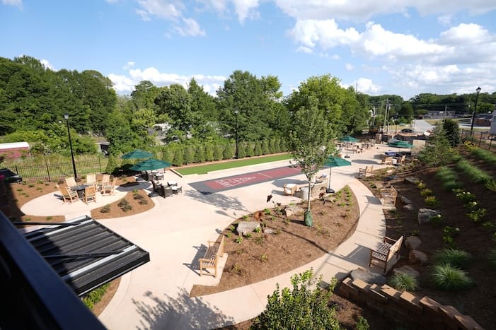 Park Place courtyard with shuffleboard and seating