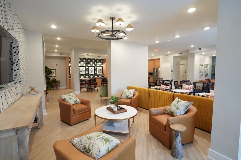 Clubroom lounge with armchairs and sofa